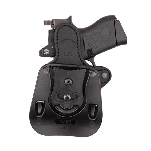 The 1791 Gunleather Paddle OWB right-hand holster delivers classic leather craftsmanship with modern convenience. Made from premium black leather, the paddle-style design allows quick on-and-off wear without removing your belt, making it perfect for range days, training, or open carry. The holster provides secure retention and a smooth, consistent draw while remaining comfortable for extended use. Built to break in naturally over time, it molds to your firearm for a custom fit. Customers searching for leather paddle holsters, OWB right-hand holsters, or premium 1791 Gunleather carry solutions will find this an excellent option. Available online or in store at Sturgis Guns in Sturgis, SD.