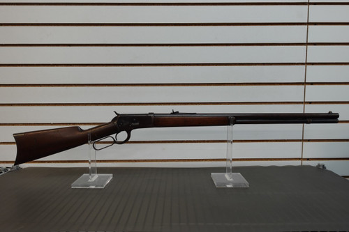 Original 1894 Winchester Model 1892 lever-action rifle chambered in .38 WCF (.38-40 Winchester). Includes an authentic Cody Firearms Museum factory letter documenting its original configuration and shipment information, enhancing collector value.