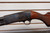 1949 ITHACA MODEL 37 12 GA 2 3/4" FACTORY ENGRAVED GAME SCENE,Ithaca Model 37 1949 engraved shotgun, Ithaca 37 game scene engraving close up, vintage Ithaca pump shotgun, bottom eject shotgun detail, Ithaca 12 gauge wood stock, engraved receiver
