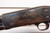 1949 ITHACA MODEL 37 12 GA 2 3/4" FACTORY ENGRAVED GAME SCENE,Ithaca Model 37 1949 engraved shotgun, Ithaca 37 game scene engraving close up, vintage Ithaca pump shotgun, bottom eject shotgun detail, Ithaca 12 gauge wood stock, engraved receiver