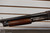 1949 ITHACA MODEL 37 12 GA 2 3/4" FACTORY ENGRAVED GAME SCENE,Ithaca Model 37 1949 engraved shotgun, Ithaca 37 game scene engraving close up, vintage Ithaca pump shotgun, bottom eject shotgun detail, Ithaca 12 gauge wood stock, engraved receiver