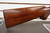 1949 ITHACA MODEL 37 12 GA 2 3/4" FACTORY ENGRAVED GAME SCENE, Ithaca Model 37 1949 engraved shotgun, Ithaca 37 game scene engraving, vintage Ithaca pump shotgun, bottom eject shotgun detail, Ithaca 12 gauge wood stock, engraved receiver close up