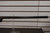 1949 ITHACA MODEL 37 12 GA 2 3/4" FACTORY ENGRAVED GAME SCENE,Ithaca Model 37 1949 engraved shotgun, Ithaca 37 game scene engraving close up, vintage Ithaca pump shotgun, bottom eject shotgun detail, Ithaca 12 gauge wood stock, engraved receiver