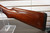 Winchester Model 12 1930 shotgun, vintage Winchester pump 12 gauge, Model 12 field grade side view, pre war Winchester shotgun, classic wood stock shotgun, Winchester 12ga