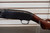 Winchester Model 12 1930 shotgun, pre war Winchester pump 12 gauge, Model 12 field grade side view, vintage Winchester shotgun wood stock, classic pump shotgun close up, Winchester 12ga