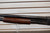 Winchester Model 12 1930 shotgun, pre war Winchester pump 12 gauge, Model 12 field grade side view, vintage Winchester shotgun wood stock, classic pump shotgun close up, Winchester 12ga