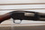 Winchester Model 12 1930 shotgun, vintage Winchester pump 12 gauge, Model 12 field grade side view, pre war Winchester shotgun, classic wood stock shotgun, Winchester 12ga