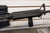 Battle Arms Development BAD-15 AR-15 rifle equipped with Vortex SPARC red dot sight, LaRue Tactical grip, and Magpul stock.