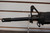 Battle Arms Development BAD-15 AR-15 rifle equipped with Vortex SPARC red dot sight, LaRue Tactical grip, and Magpul stock.