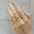 Sapphire and Diamond tiny hands ring by Anthony Lent, shop online at tomfoolery London | www.tomfoolerylondon.co.uk