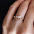 V-shape Seven Diamond Ring by N+A New York, Noriko and Akiko Sugawara available to buy online at tomfoolery london