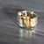 Gold Ribbon Art Ring by Marion Lebouteiller available at tomfoolery London as a part of Art Ring 2023 exhibition.