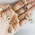 Mia Chicco: Champagne Pavé Diamond & 9ct Rose Gold Curved Ring, Tomfoolery