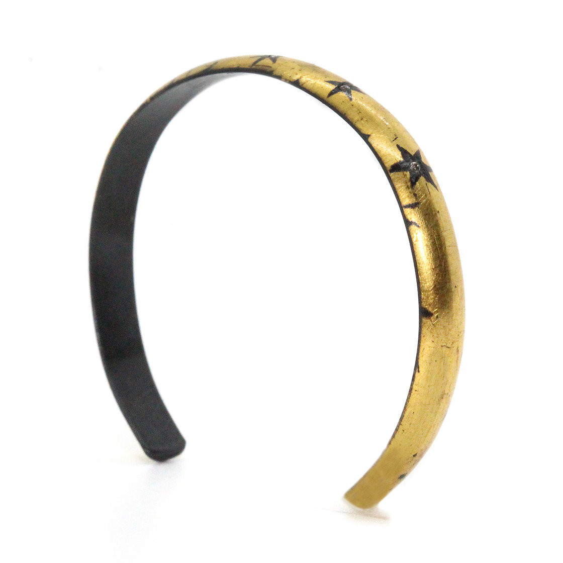 5 star cloaked cuff bracelet by Acanthus available to shop online at tomfoolery London | www.tomfoolerylondon.co.uk