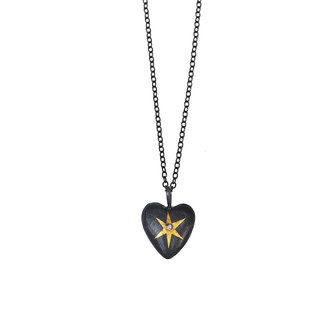 Heart wrapped star pendant by Acanthus available to shop online at tomfoolery London | www.tomfoolerylondon.co.uk