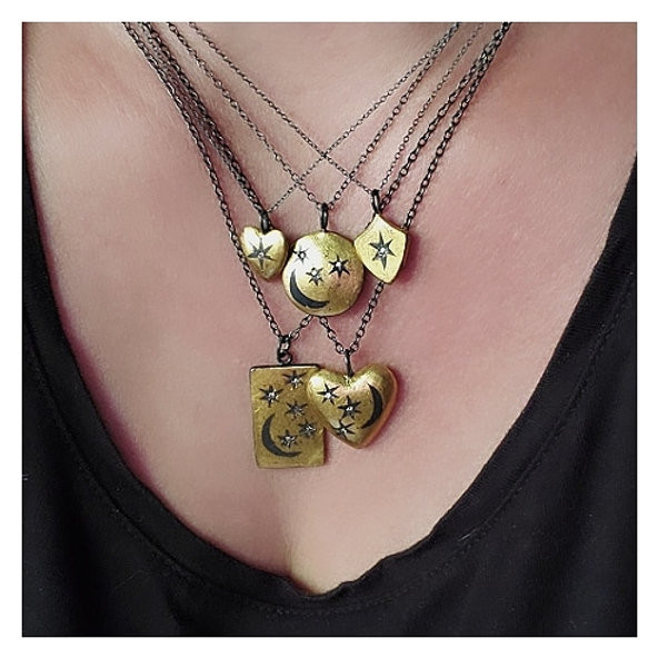 Heart wrapped star pendant by Acanthus available to shop online at tomfoolery London | www.tomfoolerylondon.co.uk