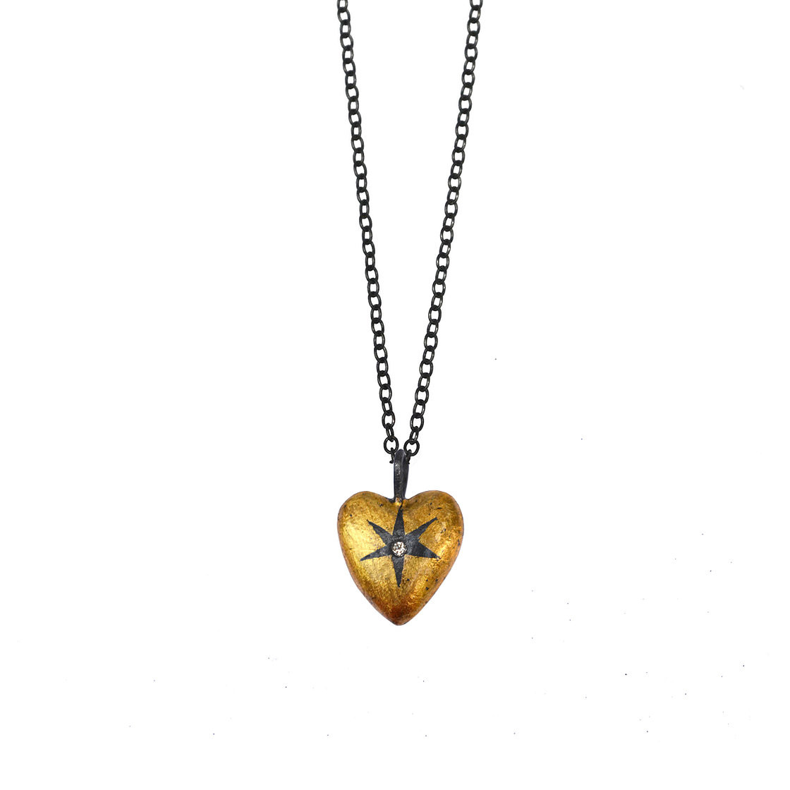 Heart wrapped star pendant by Acanthus available to shop online at tomfoolery London | www.tomfoolerylondon.co.uk