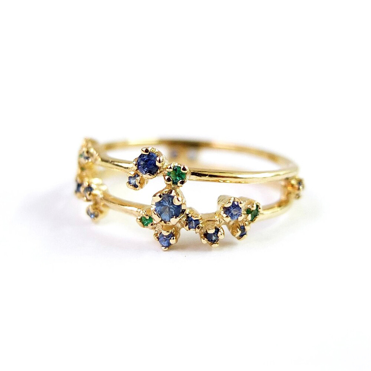 Sparkler Double Band Ring with Blue Sapphire + Emerald by N+A New York, Noriko and Akiko Sugawara available to buy online at tomfoolery london