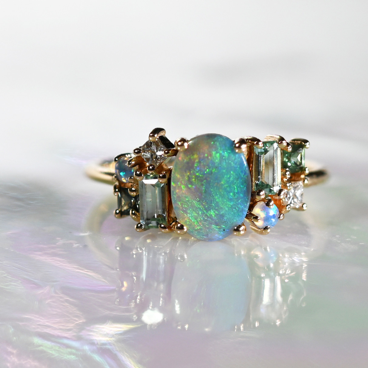 Oval Cabochon Opal Mosaic Art Ring by WWAKE available at tomfoolery London as a part of Art Ring 2023 exhibition.