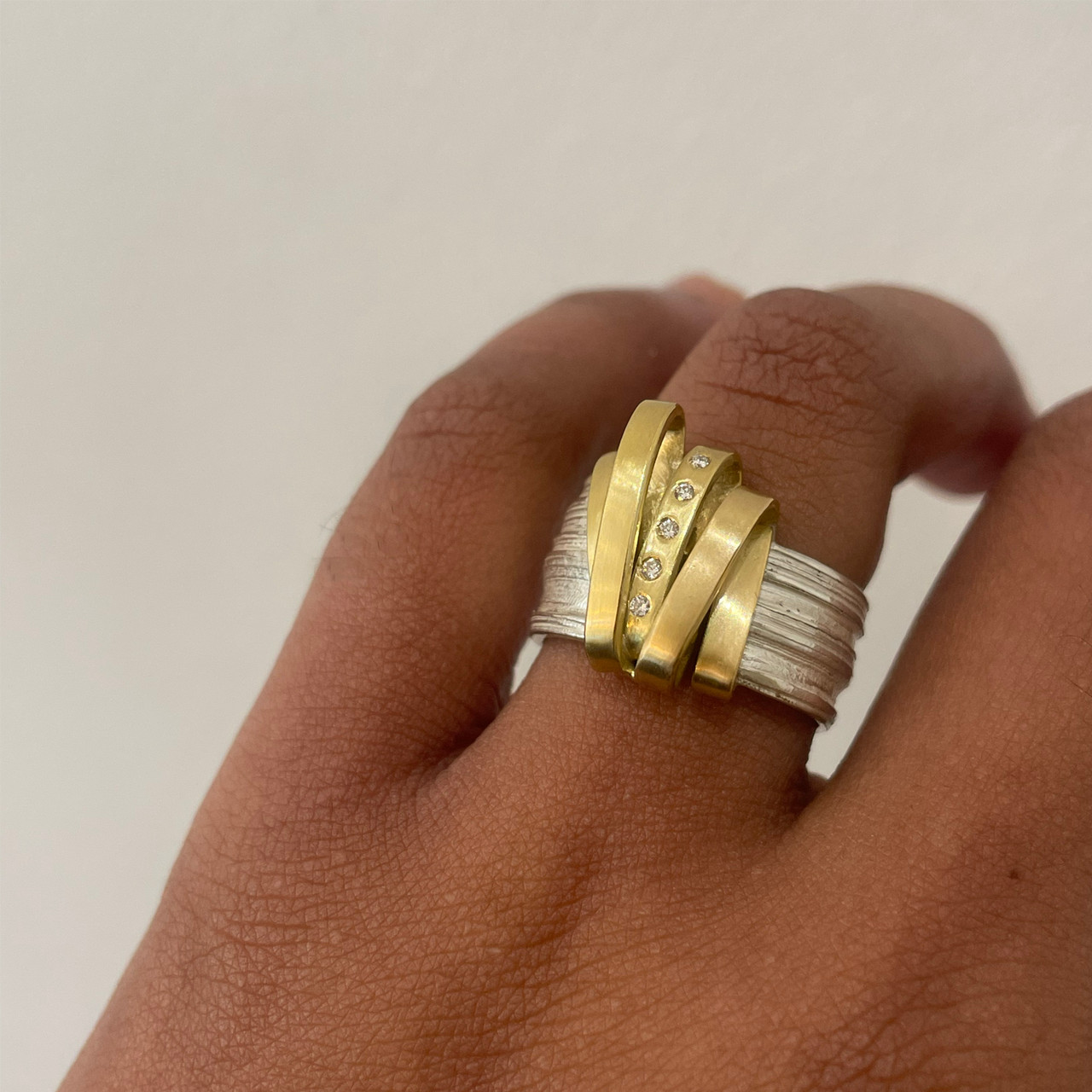Gold Ribbon Art Ring by Marion Lebouteiller available at tomfoolery London as a part of Art Ring 2023 exhibition.