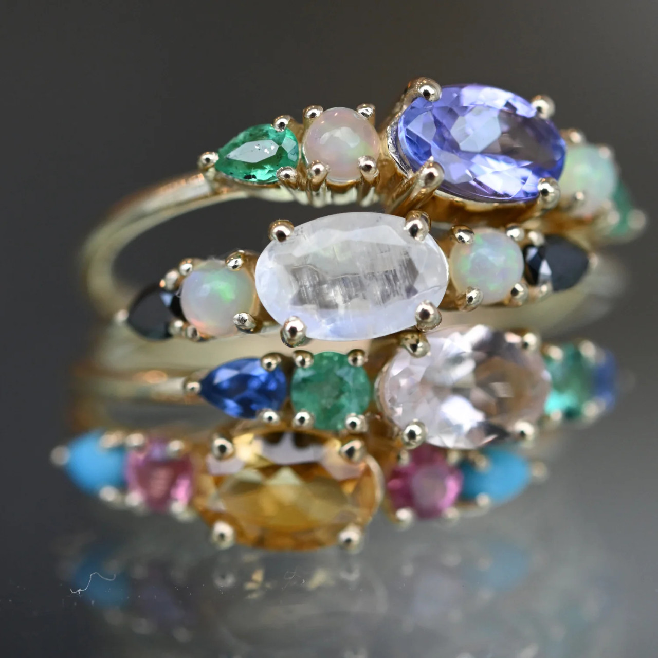 Multi Gemstone Claw Set Ring with Tanzanite, Opal & Emerald, by metier by tomfoolery