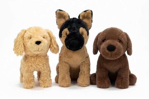 Group shot of 3 plush dog toys including German shepherd and 2 Labradors