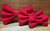 Solid red handmade pet bow tie with double elastic loops for dog collar attachment