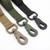 Close-up of heavy-duty zinc alloy swivel clips on Coyote Tan, OD Green, and Black tactical leashes. Shows reinforced stitching and 360-degree rotating metal hardware