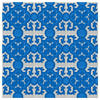 Repeating pattern of blue and white Luciana relief tiles.