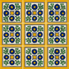 Grid of "Colonial Sun" Talavera tiles with navy flowers, green foliage, and yellow centerpieces on a white and gold background.