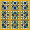 Grid of "Colonial Sun" Talavera tiles with navy flowers, green foliage, and yellow centerpieces on a white and gold background.
