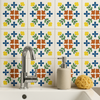 Colorful floral Mexican tiles used as a bathroom backsplash.