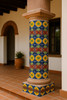 Fiesta Garden wrapped around a round hacienda column in a Mexican courtyard Fiesta Garden wrapped around a round hacienda column in a Mexican courtyard