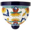 Sunrise Garden Talavera Sconce showcasing hand-painted floral designs inspired by morning light.