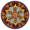 Dolores Glow Talavera Plate featuring a radiant red background with yellow, green, and cobalt geometric motifs.