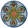 Cuernavaca Grace Talavera Plate featuring hand-painted red and yellow motifs with soft blue and white background details.