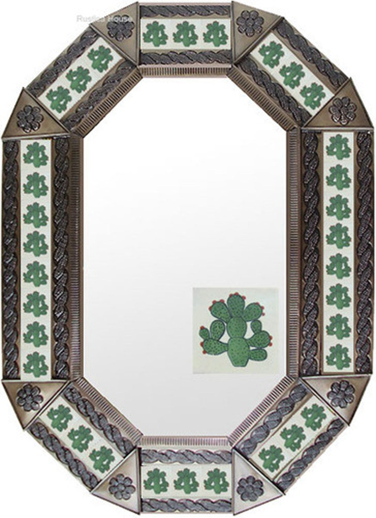 Nopal Tin Mirror with a copper toned frame highlighting the warm contrast between the metal texture and the painted cactus tiles.