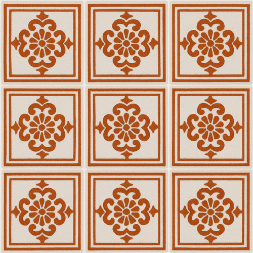 Mexican tile with rust-colored floral pattern on a white background.