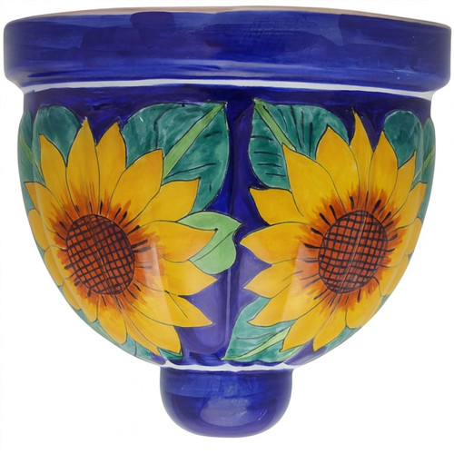 Sunfield Talavera Sconce hand-painted wall light with radiant yellow sunflower motifs on a deep cobalt blue base.