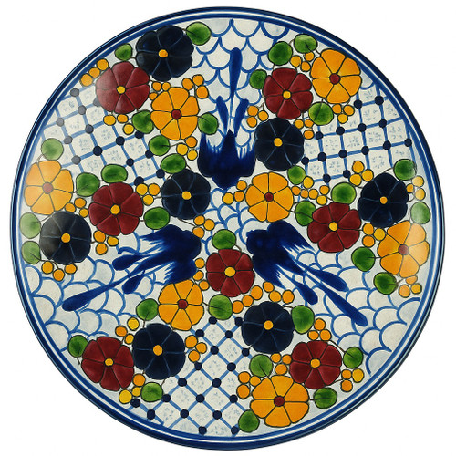 Garden Serenade Talavera Plate featuring hand-painted birds among red, yellow, and blue blossoms.