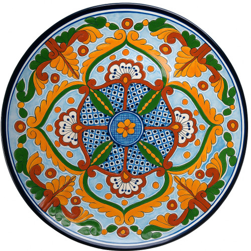 Aurora Lineage Talavera Plate featuring hand-painted yellow, green, and cobalt blue ornamental motifs.