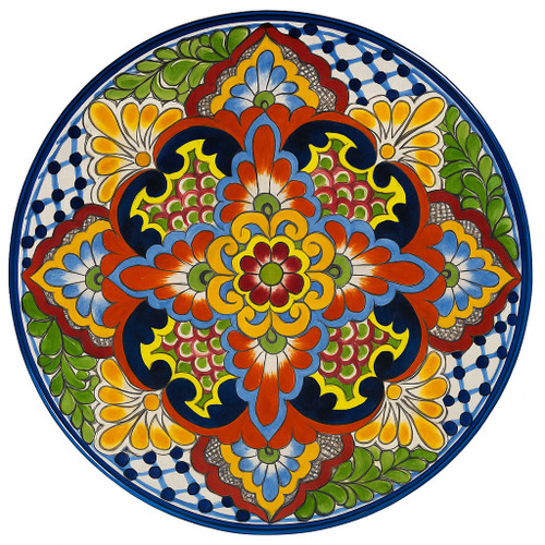 Morelia Dawn Talavera Plate featuring intricate hand-painted symmetry in red, blue, and yellow tones.