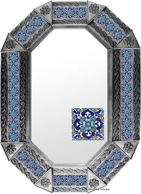 Indigo Tile Tin Mirror in a natural tin finish showcasing detailed metal embossing paired with vivid indigo and blue patterned tiles along the border.