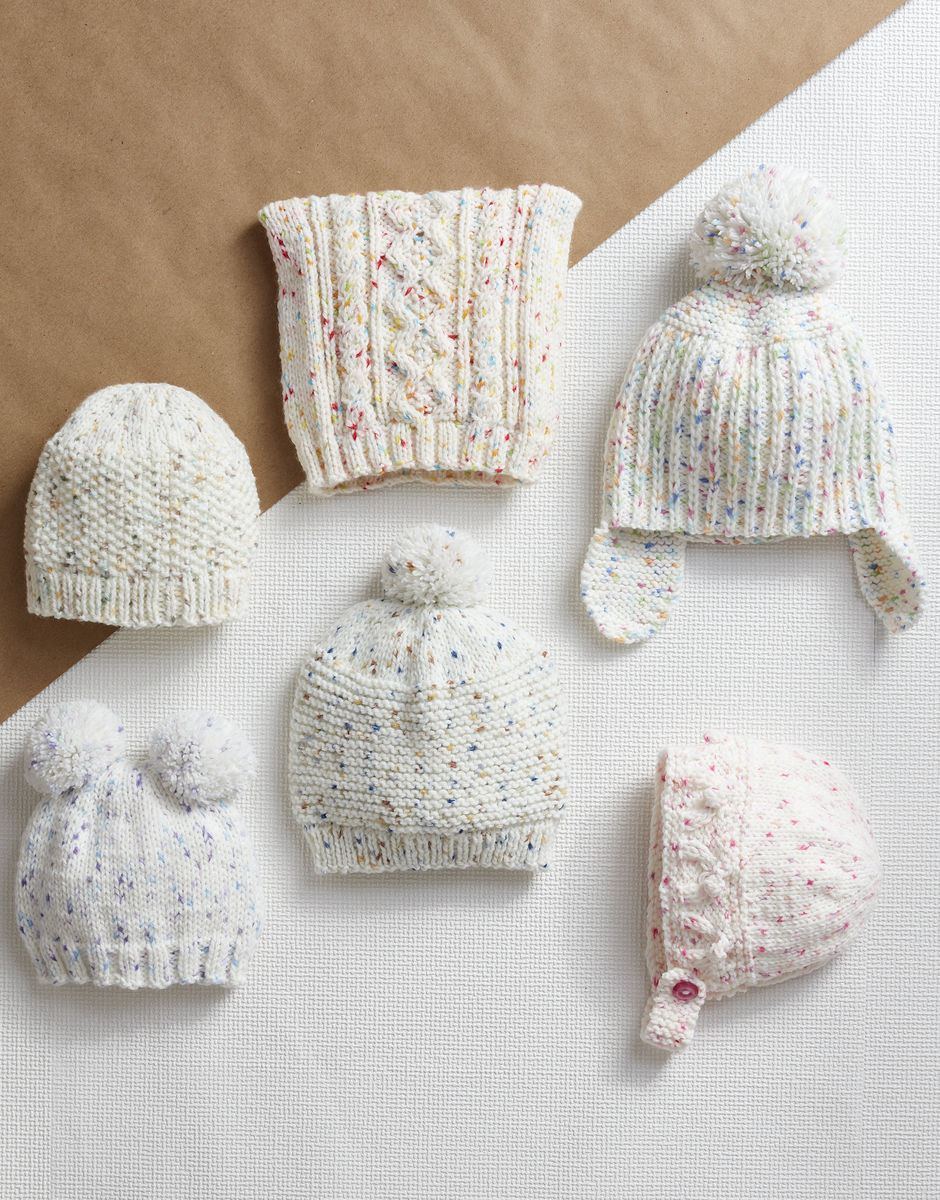 Selection of Baby Hats in Sirdar Supersoft Aran Rainbow Drops (5181)