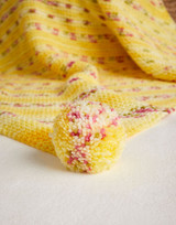 Petal Pom Pom Blanket in Hayfield Baby Blossom Chunky (5575) - PDF