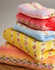 Petal Pom Pom Blanket in Hayfield Baby Blossom Chunky (5575) - PDF