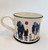 This mug depicts three of the Alexander Millar's best loved paintings - "Dad", "Mams, Dads, Aunties and Uncles" and "Mam".