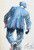 Cork High, Bottle Deep is an original oil painting from Alexander Millar's Little Gem collection. It shows a man in working class clothes from the 1950s walking away from the viewer. he is carrying what could be a bottle of whiskey in his hand and he looks as if he is staggering away after having too much to drink.
