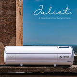 Image of a closed white Siser Juliet High-Definition Cutter facing the viewer with a scenic background and copy in the upper right-hand corner of the image reading “Juliet – a new love story begins here …”