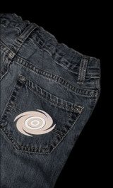 Image of jeans with a galaxy graphic using Silver Black EasyReflective Heat Transfer Vinyl and Dark Gray EasyReflective Heat Transfer Vinyl illuminated and reflecting.